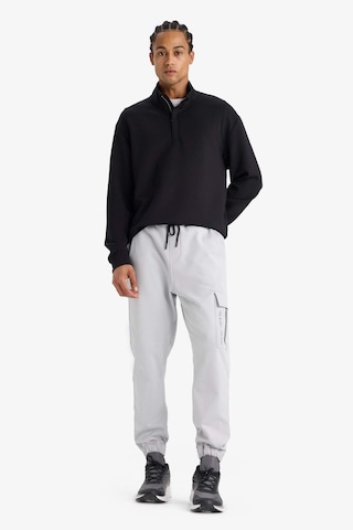 DeFactoFit Sporcu Jogger Eşofman Altı Standart Fit Üç Cepli Beli Bağcıklı Lastikli Paça D3741AX24WNGR523 Gri