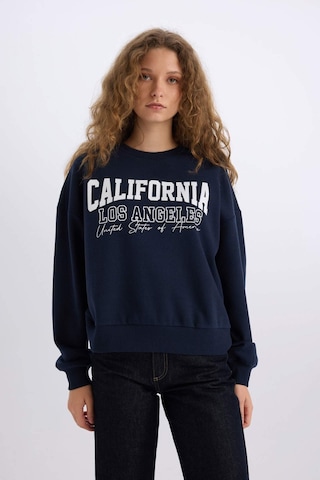 DeFacto Loose Fit Bisiklet Yaka Baskılı Kalın Kumaş Sweatshirt E3390AXNSNV44