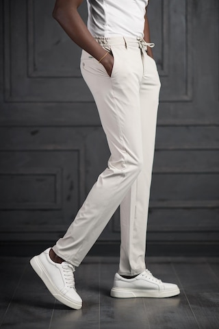 Beli Lastikli Ve İplikli Likralı Yazlık İnce Paraşüt Kumaş Jogger Pantolon Krem