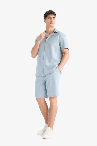 DeFacto %100 Pamuk Relax Fit Cepli Keten Görünümlü Bermuda Şort C7381AX25SMBE524