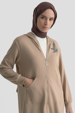 Armine Trend Boydan Fermuarlı Kanguru Cepli Kapüşonlu Taşlı Aksesuarlı Tunik Bej 25yt542 Bej