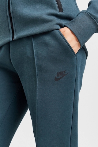 Nike Sportswear Tech Fleece Standart Fit Mid Rise Jogger Kadın Eşofman Altı Koyu Yeşil