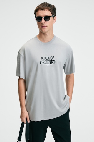 Grimelange FEAST Erkek %100 Pamuk Oversize Fit Baskılı Kısa Kollu Yuvarlak Yakalı Açık Gri T-Shirt