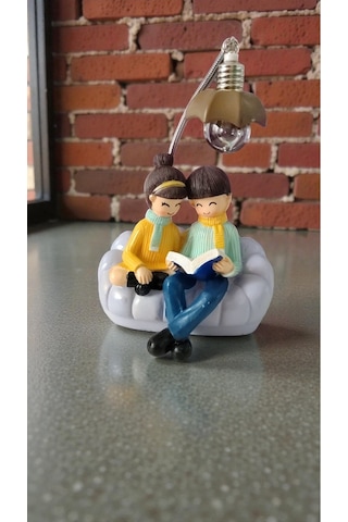 Oturan Çift Hediyelik Ürün Biblo Ürün Boyutu: 20cm 13cm