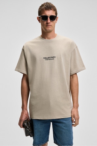 Grimelange COLLECTIVE Erkek Ön Nakış Arka Baskı Detaylı %100 Organik Pamuk Oversize Kısa Kol Taş Rengi T-Shirt