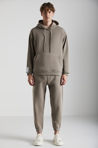 Ashbourne Erkek Oversize Kanguru Cepli Kol Etiket Detaylı Organik Pamuk Vizon Eşofman Takımı