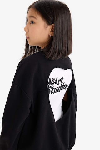 DeFacto Kız Çocuk Oversize Geniş Kalıp Bisiklet Yaka Sırt Baskılı Sweatshirt D9209A825SPBK81 Siyah