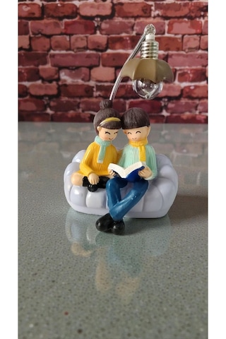 Oturan Çift Hediyelik Ürün Biblo Ürün Boyutu: 20cm 13cm