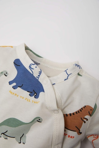 DeFacto Erkek Bebek Yenidoğan Dinazor Baskılı Çıtçıtlı Penye Uzun Kollu Tulum E6044A5NSER233 Ekru