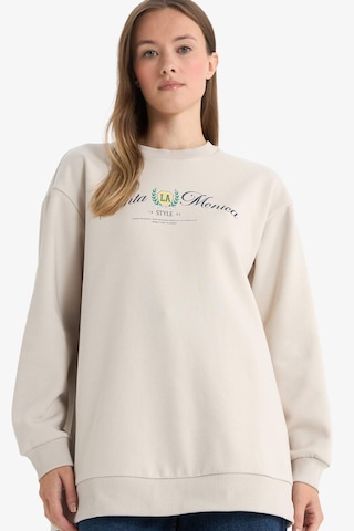 Defacto Regular Fıt Bisiklet Yaka Baskılı İçi Yumuşak Tüylü Sweatshirt Tunik F3088ax25wnbg186 Bej-bg186