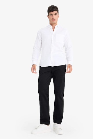DeFacto Slim Fit Dar Kesim Polo Yaka Dokulu Uzun Kollu Beyaz Gömlek T2066AZ25SPWT34