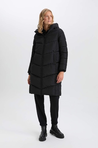 DeFacto Su İtici Uzun Şişme Mont Parka Isı Yalıtımlı Kapüşonlu Kapitoneli fermuarlı Cepli A3174AX24WNBK27 Siyah