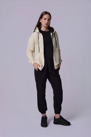 Defys Defy S Kadın Oversize Kapüşonlu Fermuarlı Cepli Sweatshirt Bej - 527346818 Bej