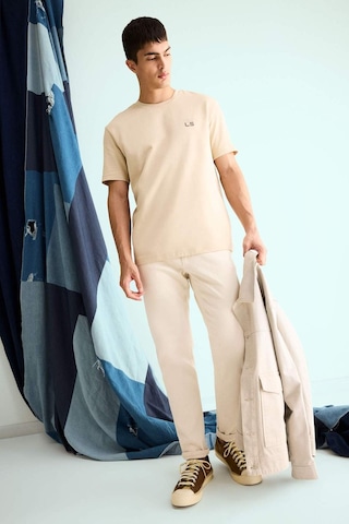 Defacto Regular Fit Bisiklet Yaka Baskılı Kısa Kollu Tişört F3472ax25aubg539 Bej
