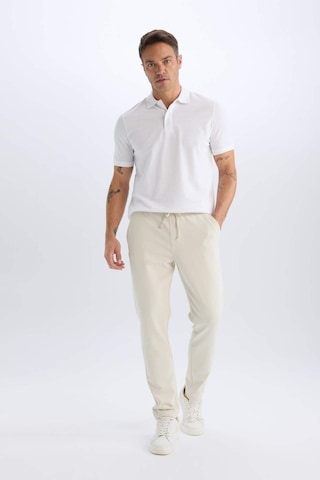 DeFacto %100 Pamuk Regular Fit Polo Yaka Kısa Kollu Basic Düz Pike Kumaş Tişört C1293AX25SPWT34