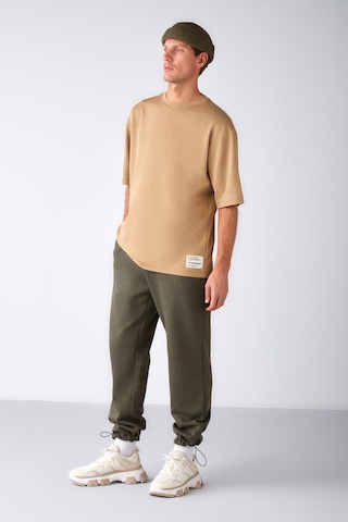 Grimelange Joel Erkek %100 Organik Pamuklu Kalın Kumaşlı Özel Dokulu Etiket Detaylı Oversize Bej T-shirt