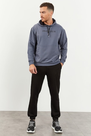 Tommy Life Petrol - Siyah Kapüşonlu Kanguru Cep Lastik Paça Erkek Oversize Eşofman Takımı - 85117 Petrol Mavi