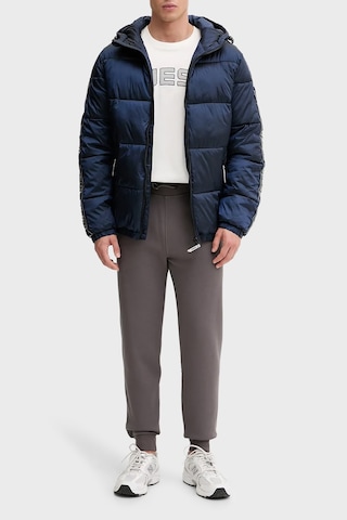 Guess Arlo Kapitoneli Regular Fit Kapüşonlu Şişme Mont Z5bl17wo06ı Erkek Mont Z5bl17 Wo06ı G7r1 Mavi