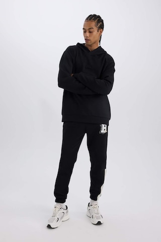 DeFactoFit NBA Boston Celtics Jogger Eşofman Altı Standart Fit Beli Bağcıklı Cepli Lastikli Paça D1562AX24WNBK81 Siyah