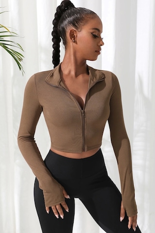 İmoda Kadın Kahverengi Uzun Kol Fermuarlı Parmak Geçme Detaylı Dik Yaka Crop Top Bluz Kahverengi