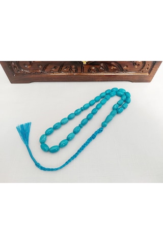 Turkuaz Renginde Örgülü Püskül Modelli Katalin...