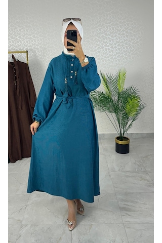 Kadın Petrol Rengi Karin Aerobin Kumaş Yarım Ön Düğmeli Püskül Bağcık Kuşaklı Tesettür Elbise Petrol