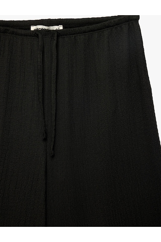 Koton Bürümcük Kumaş Beli Bağcıklı Düz Geniş Paça Pantolon Siyah 6sak40111ek
