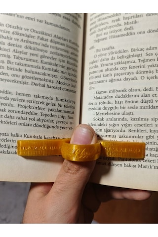 Tek Elle Kitap Tutucu