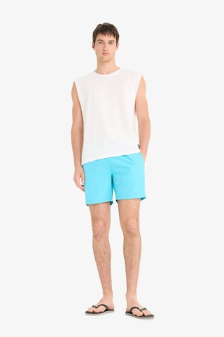 DeFacto Regular Fit Kısa Boy Cepli File Astarlı Beli Bağcıklı Düz Hafif Kumaş Deniz Şortu E5133AXNSTR111
