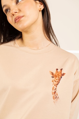 Ters Dikiş Detaylı Figürlü Bisiklet Yaka Sweatshirt Sütlü Kahve