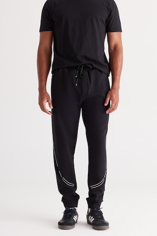 AC&Co / Altınyıldız Classics Erkek Sıyah Standart Fit Normal Kesim Baskılı Eşofman Altı Siyah