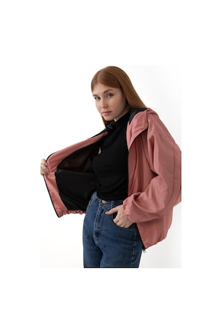 Spor Kadın Kapüşonlu Su Ve Rüzgar Geçirmez Cepli İçi Astarlı Oversize Mevsimlik Yağmurluk Pudra