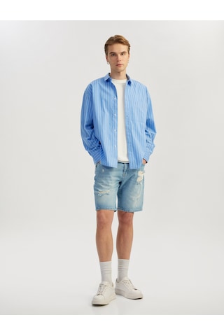 Koton Pamuklu Yırtık Detaylı Bermuda Slim Fit Jean Şort Orta İndigo 5sam40005ıd İndigo