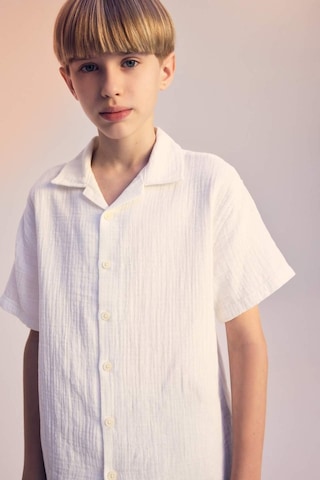 DeFacto Erkek Çocuk Oversize Geniş Kalıp Polo Yaka Müslin Kısa Kollu Gömlek W3239A625HSWT34