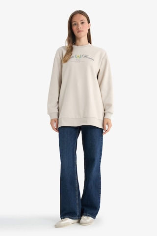 Defacto Regular Fıt Bisiklet Yaka Baskılı İçi Yumuşak Tüylü Sweatshirt Tunik F3088ax25wnbg186 Bej-bg186