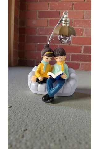 Oturan Çift Hediyelik Ürün Biblo Ürün Boyutu: 20cm 13cm