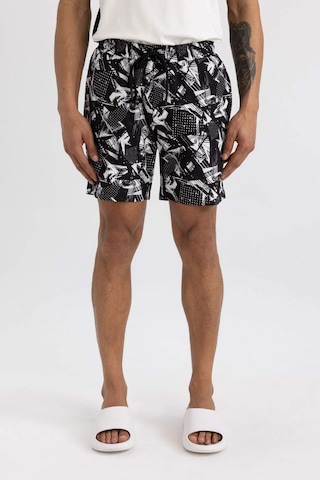 DeFactoFit Regular Fit Baskılı Esnek Dokulu Diz Boyu Sporcu Deniz Şortu B5994AX24HSBK81 Siyah