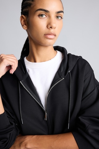 Defacto Ultra Yumuşak Oversize Fermuarlı Kapüşonlu Cepli Basic Sweatshirt Hırka H5189ax26aubk81 Siyah-bk81