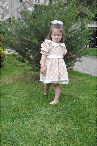 Puantiyeli Bebe Yakalı Arkası Fiyonklu Kız Çocuk Elbise Bej