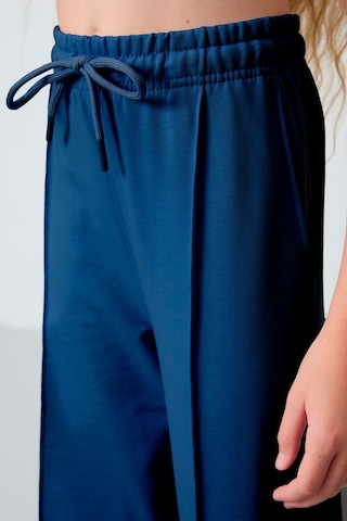 Tommy Life Parlament Cepli Ön Dikiş Detaylı Geniş Paça Kız Çocuk Eşofman Altı -75144 Mavi