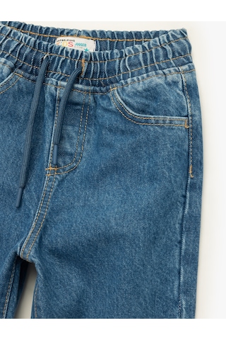 Koton Pamuklu Beli Bağcıklı Rahat Kalıp Cep Detaylı Jogger Jean Pantolon Orta İndigo 6wkb40030td Indigo