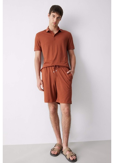 DeFacto Slim Fit Dar Kesim Polo Yaka Dokulu Kısa Kollu Krinkıl Tişört E1222AX25SMBN312