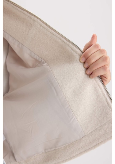 DeFacto Su İtici Regular Kalıp Polo Yaka Fermuarlı Cepli Kısa Kaşe Ceket C0935AX25SPER238 Ekru