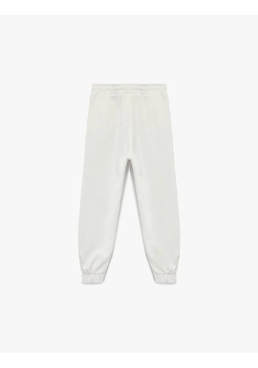 Koton Şardonlu Beli Lastikli Baskılı Jogger Ekru Kız Çocuk Eşofman Altı 6wkg40049ak Ekru