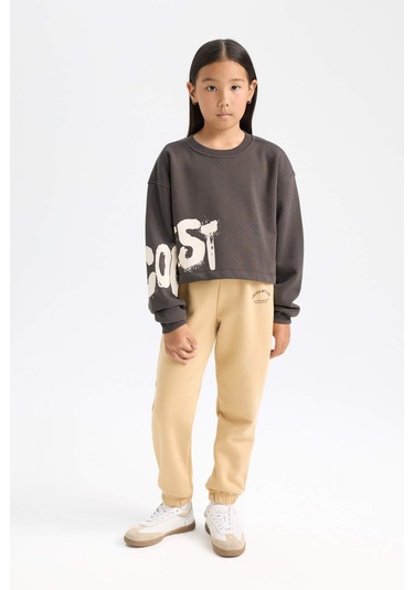 DeFacto Kız Çocuk Standart Fit Beli Paçası Lastikli Baskılı Jogger Eşofman Altı D2295A824WNBG68 Bej DeFacto Kız Çocuk Standart Fit Beli Paçası Lastikli Baskılı Jogger Eşofman Altı D2295A824WNBG68 Bej
