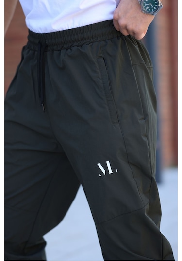 Erkek Haki Baggy Eşofman Altı Fermuarlı Paça Kaliteli Paraşüt Kumaş Haki Erkek Haki Baggy Eşofman Altı Fermuarlı Paça Kaliteli Paraşüt Kumaş Haki