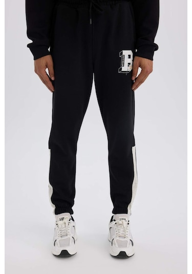 DeFactoFit NBA Boston Celtics Jogger Eşofman Altı Standart Fit Beli Bağcıklı Cepli Lastikli Paça D1562AX24WNBK81 Siyah DeFactoFit NBA Boston Celtics Jogger Eşofman Altı Standart Fit Beli Bağcıklı Cepli Lastikli Paça D1562AX24WNBK81 Siyah
