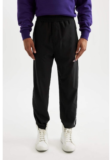 DeFactoFit NBA Los Angeles Lakers Dokuma Jogger Eşofman Altı Slim Fit Dar Kesim Cepli Ekstra Dar Paça D5647AX24AUBK81
