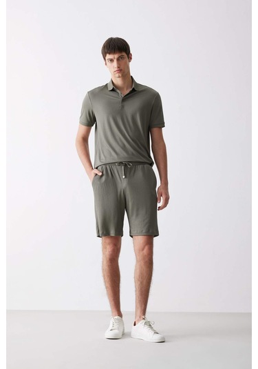 DeFacto Slim Fit Dar Kesim Polo Yaka Dokulu Kısa Kollu Krinkıl Tişört E1222AX25SMKH401