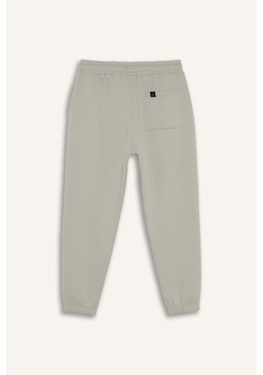 Defacto Regular Fit Beli Bağcıklı Cepli Paçası Lastikli Şardonlu Basic Düz Jogger Eşofman Altı E6326ax25aubg766 Bej